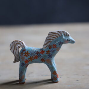 Orange daisy pony